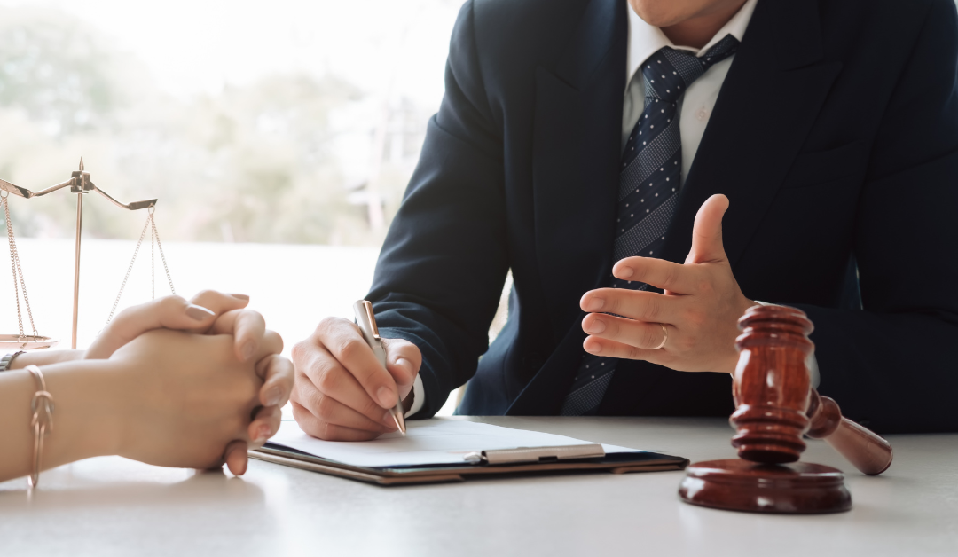 A tax attorney talking to his client