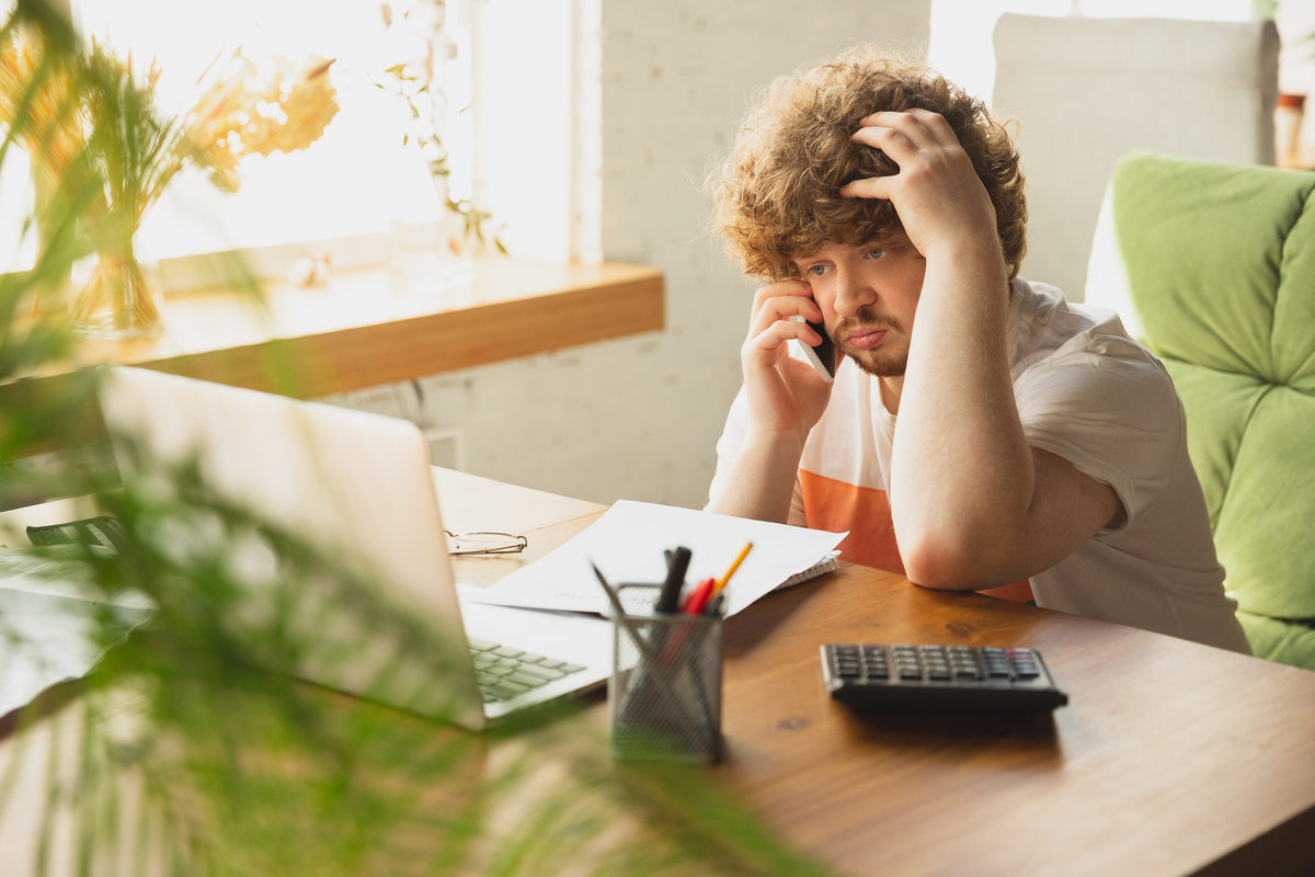 A man upset about his mistakes in filing his taxes.