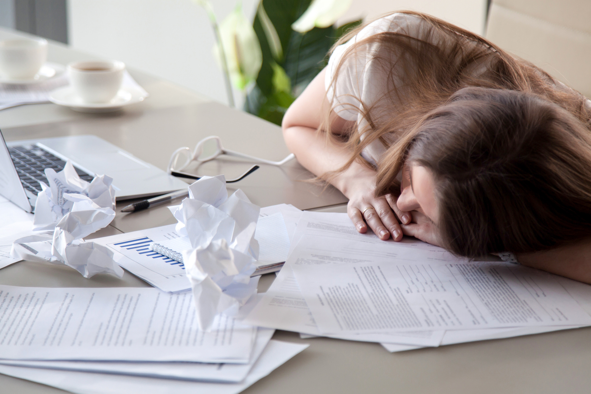 Crumpled tax documents on a table