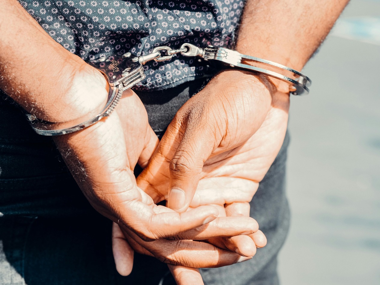 A person in handcuffs