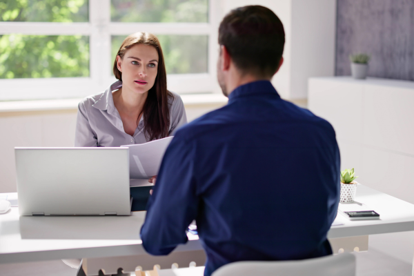 A small business owner consulting with a tax professional
