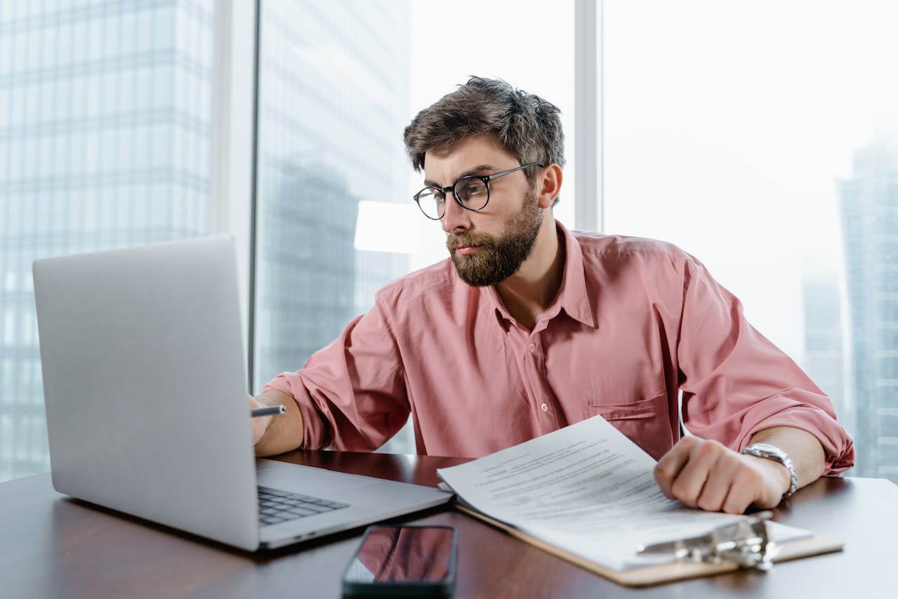 A person working on a tax audit document