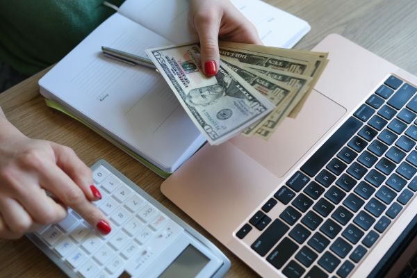 A person budgeting finances.