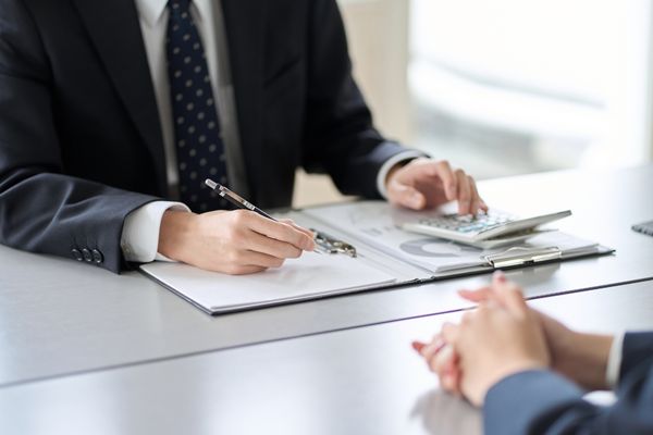 Man submitting formal appeal request document