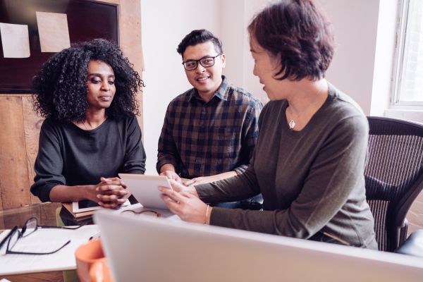 Business owners asking a consultant for their tax preparation.