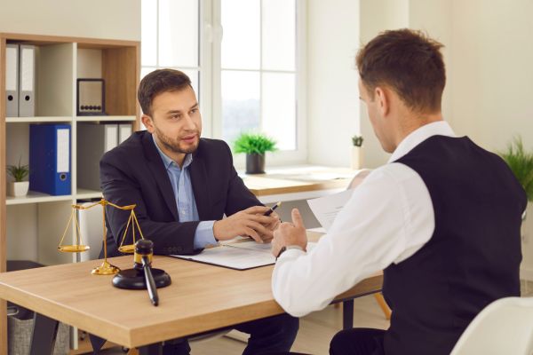 Tax lawyer giving legal advice to a client.