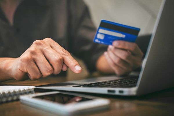 Man setting up direct debit payments
