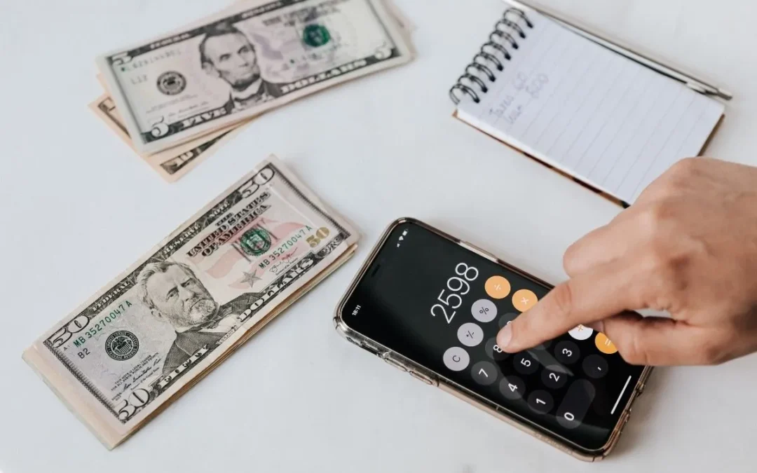 Man reviewing a budget to manage wage garnishments.