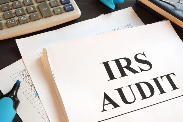 IRS audit paperwork and forms.