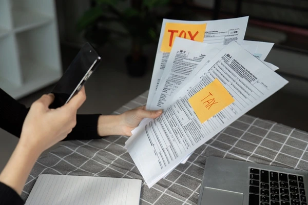 Tax preparer organizing tax documents.
