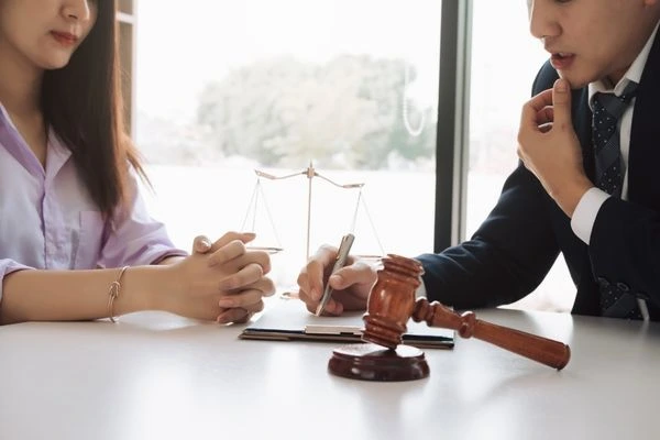 Woman receiving professional tax resolution advice