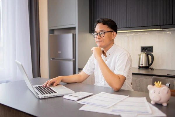 Man preparing documents for tax return