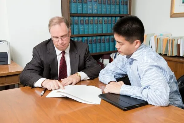 Man receiving professional tax resolution advice