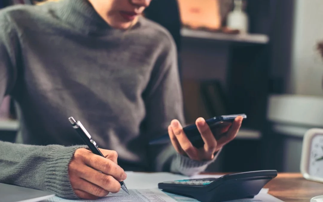 Woman calculating salary after wage garnishment