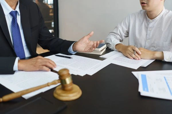 Man getting help from tax attorney