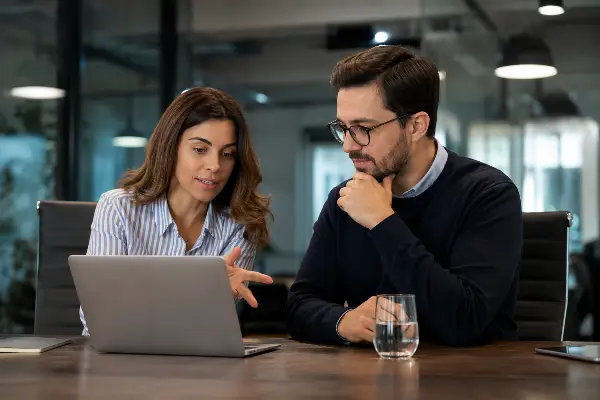 Advisor and client comparing IRS tax resolution options